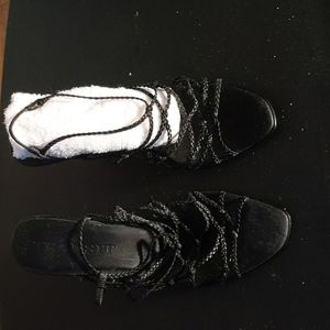 Black 3" size 10M straps shoes.